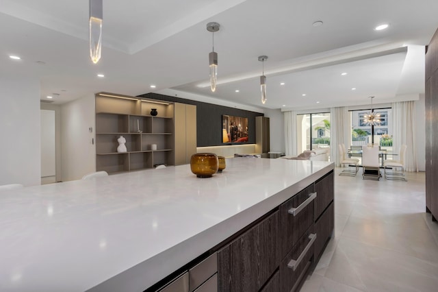 kitchen featuring hanging light fixtures and a notable chandelier