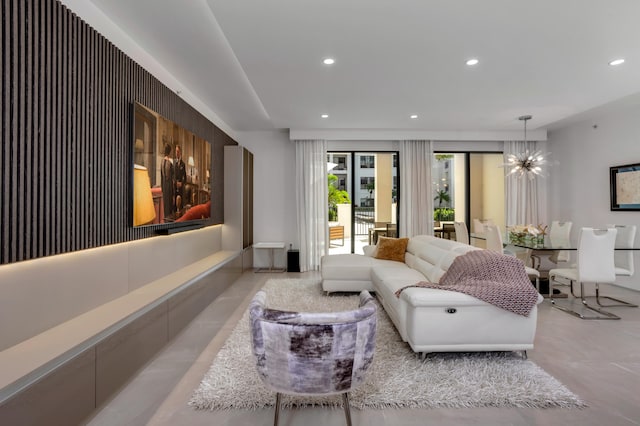 living room with an inviting chandelier