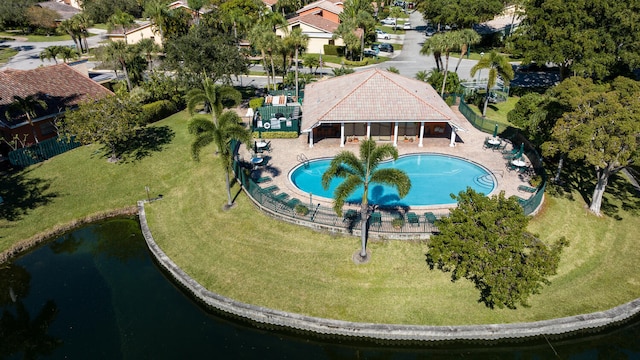 birds eye view of property with a water view