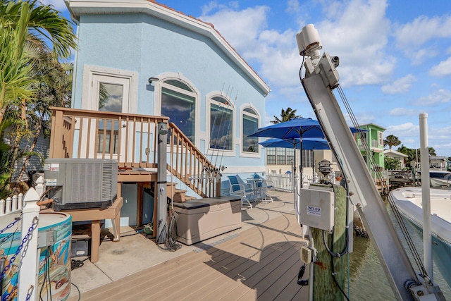 deck featuring central AC unit