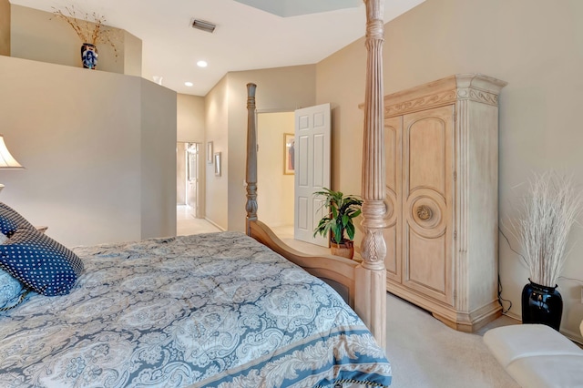 bedroom featuring light colored carpet