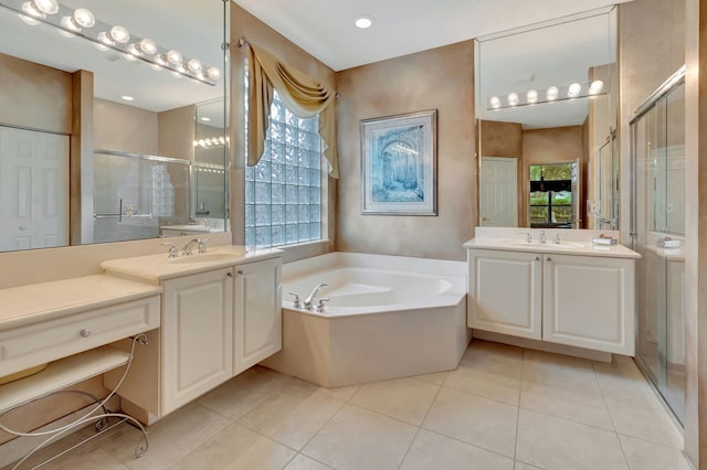 bathroom featuring vanity, separate shower and tub, and tile patterned flooring