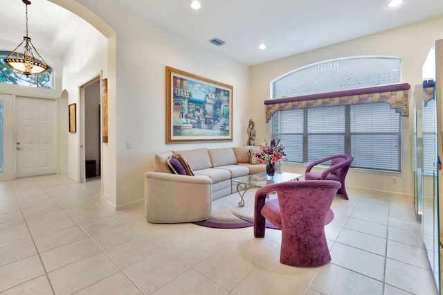 living room with light tile patterned flooring