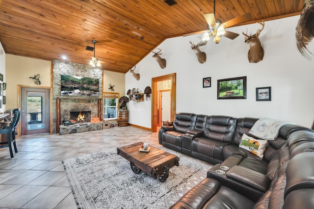 tiled living room featuring a fireplace, high vaulted ceiling, ceiling fan, and wooden ceiling