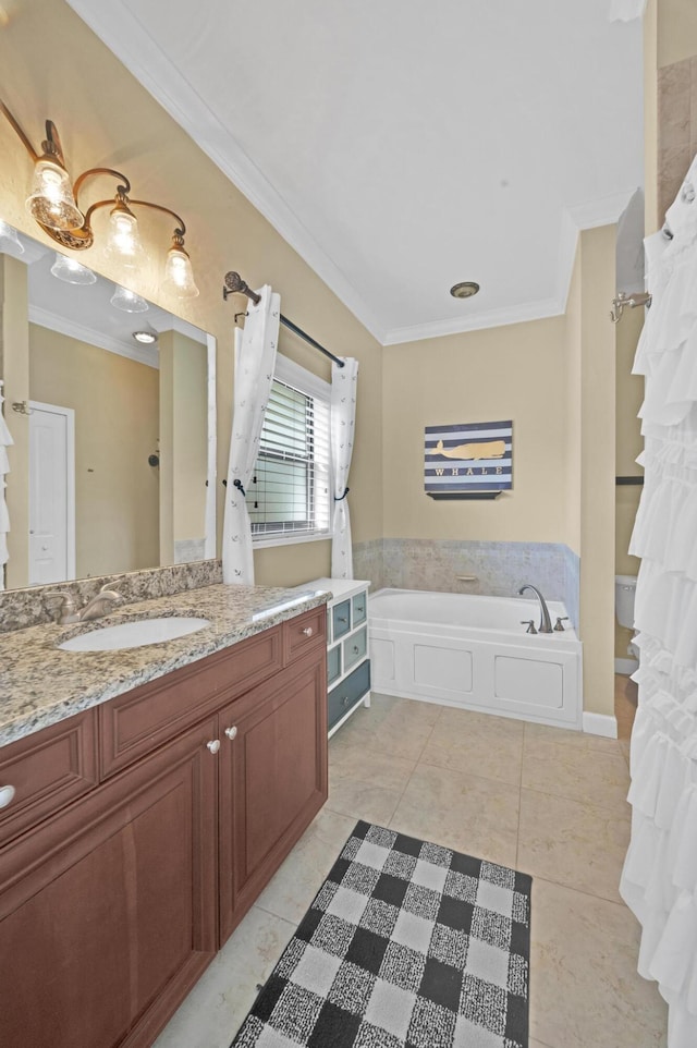 bathroom with a bathing tub, tile patterned flooring, vanity, and ornamental molding