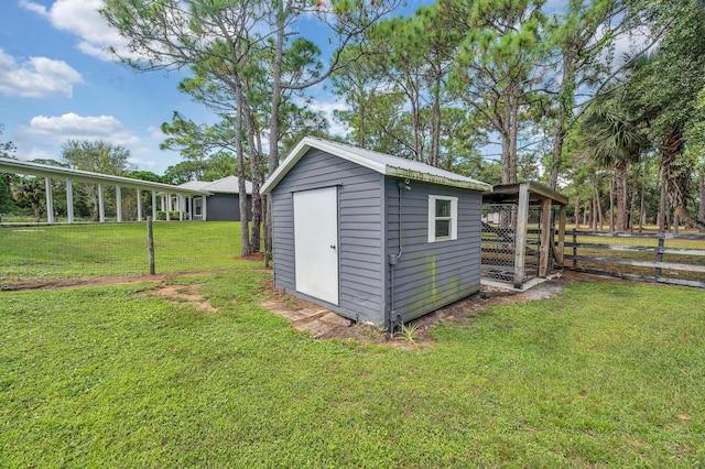 view of outdoor structure with a yard