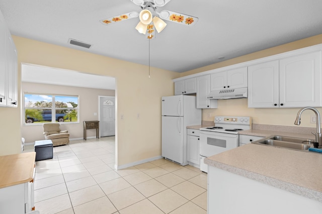 kitchen with ceiling fan, white appliances, sink, and white cabinets