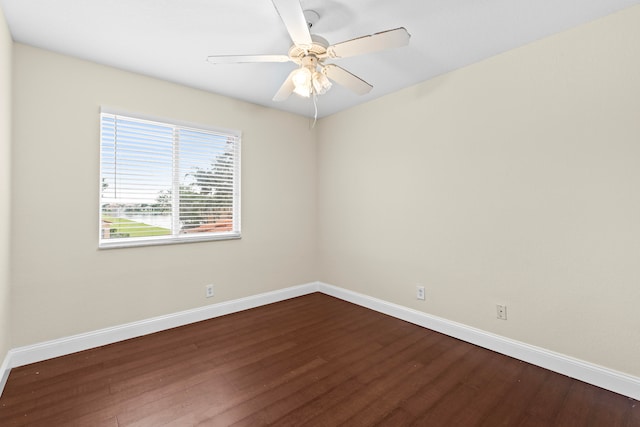 empty room featuring hardwood / wood-style flooring and ceiling fan