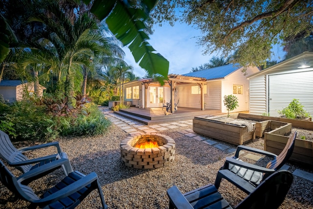 exterior space with a fire pit