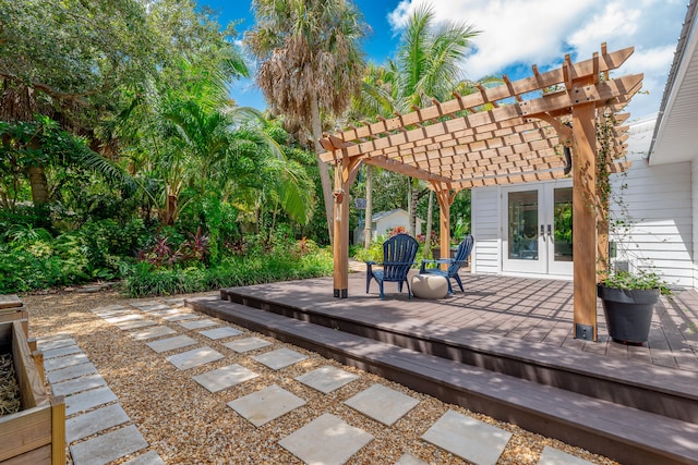 view of patio / terrace featuring a wooden deck and a pergola