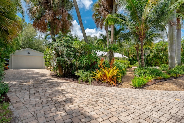 exterior space featuring an outdoor structure and a garage