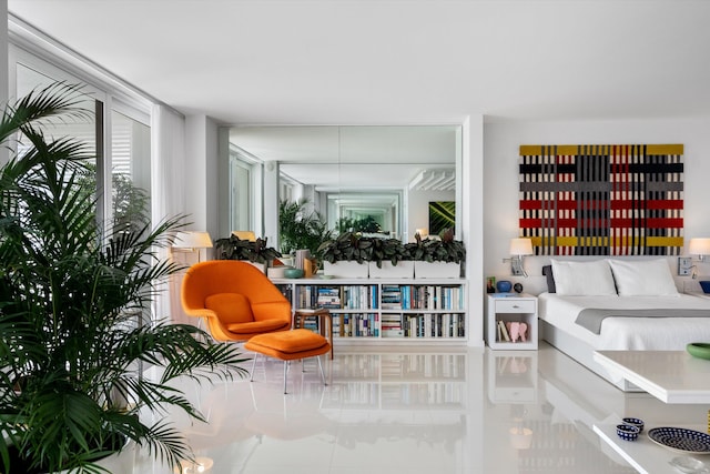 sitting room featuring tile patterned flooring