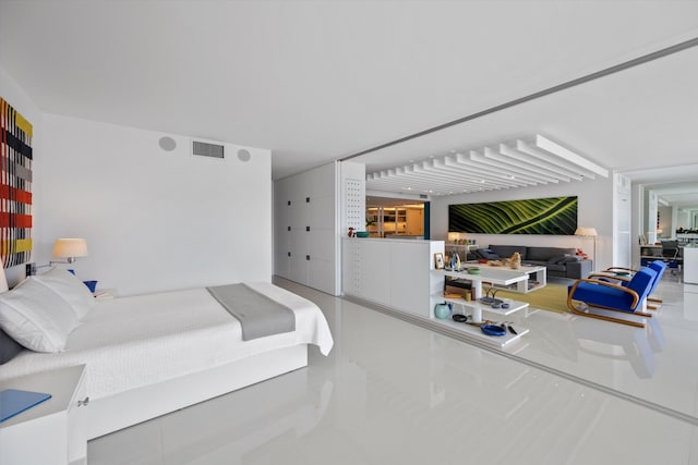 bedroom featuring visible vents