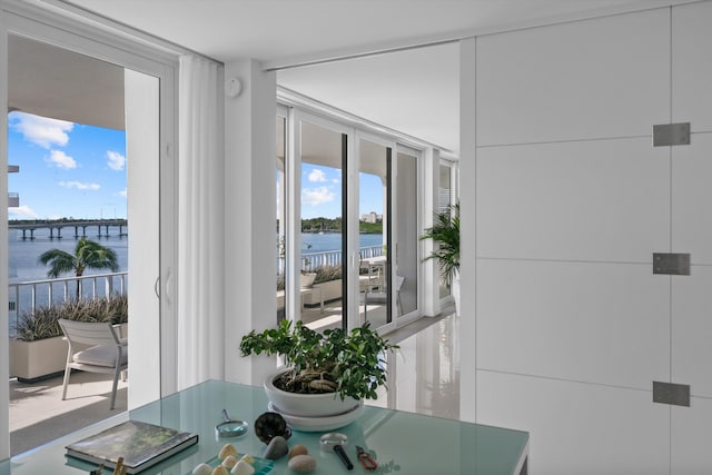 dining area featuring a water view