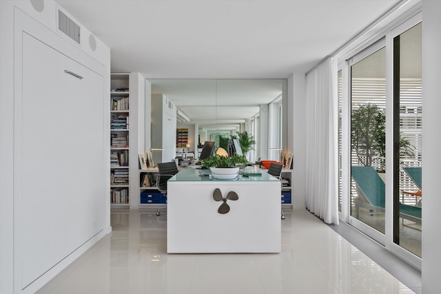 interior space with light tile patterned floors