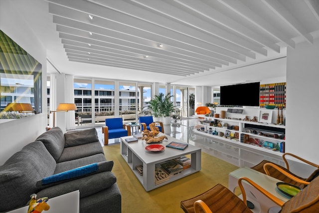 living room featuring beam ceiling