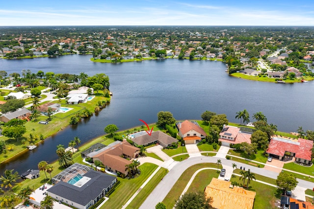 bird's eye view with a water view