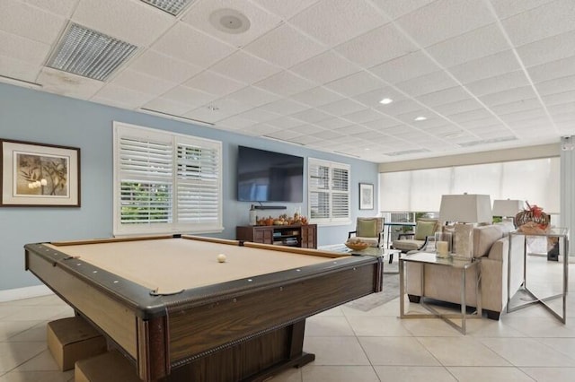 game room featuring a drop ceiling, light tile patterned flooring, and pool table