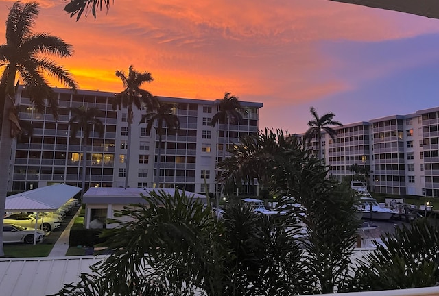 view of outdoor building at dusk