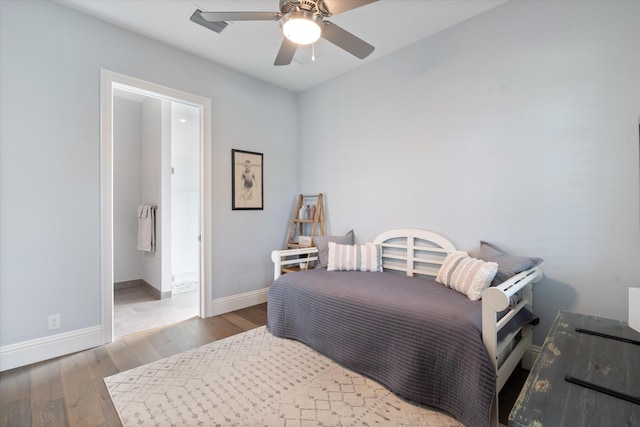 bedroom with hardwood / wood-style floors and ceiling fan