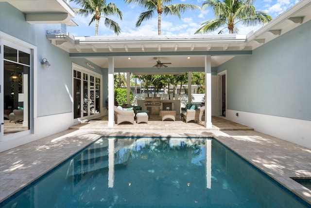 view of swimming pool featuring a patio, french doors, and ceiling fan