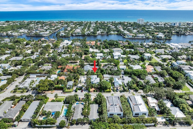 bird's eye view with a water view