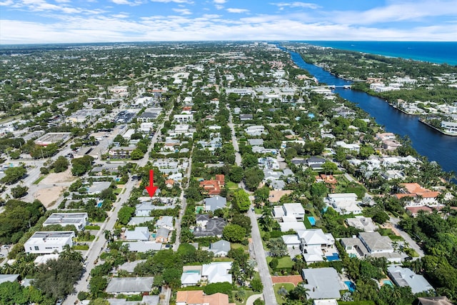 birds eye view of property featuring a water view