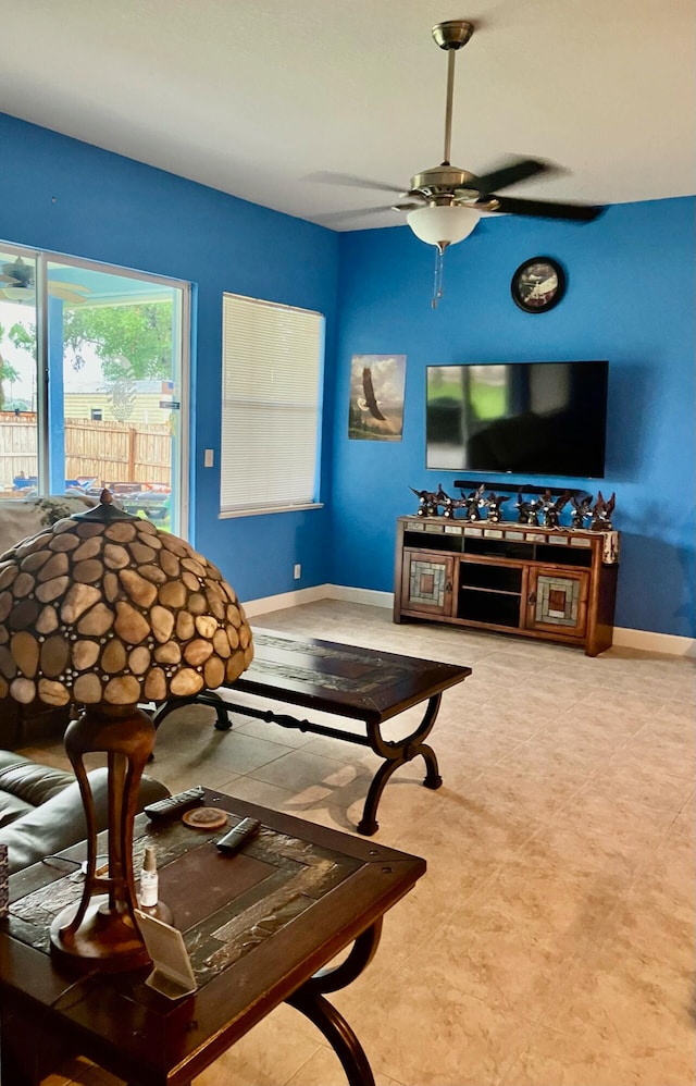 living room featuring ceiling fan