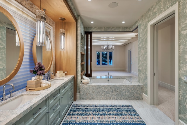 bathroom with vanity and a relaxing tiled tub