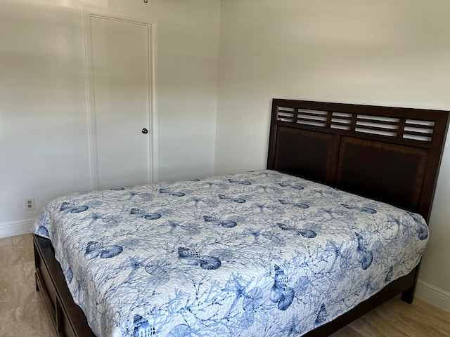 bedroom with light hardwood / wood-style floors