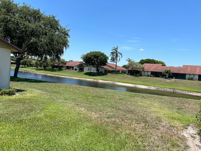 view of yard with a water view