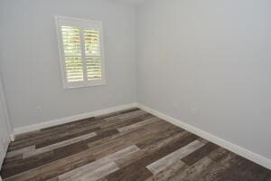 empty room featuring dark hardwood / wood-style floors