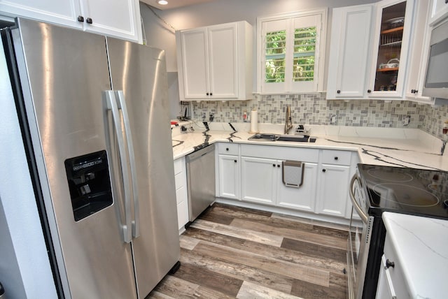 kitchen featuring white cabinets and stainless steel appliances