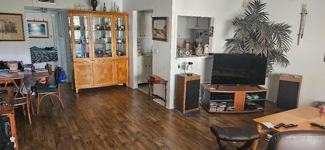 dining space with dark wood-type flooring