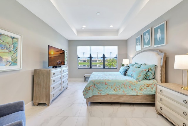 bedroom featuring a tray ceiling