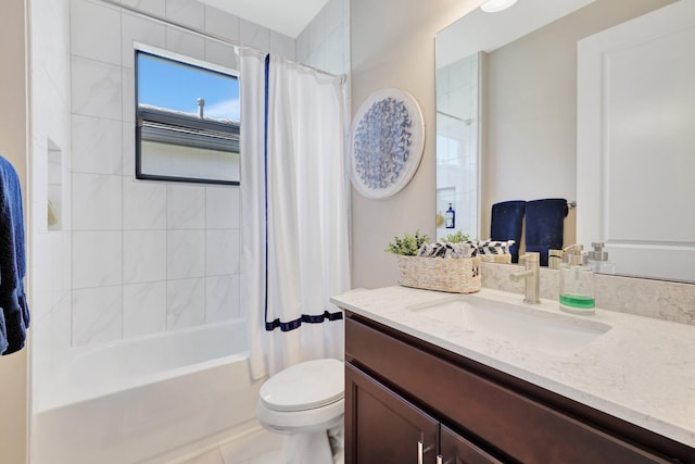 full bathroom featuring vanity, shower / tub combo with curtain, toilet, and tile patterned floors