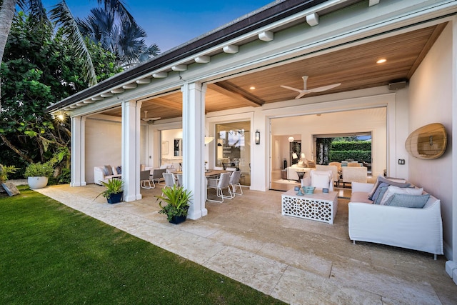 view of patio / terrace with ceiling fan and outdoor lounge area