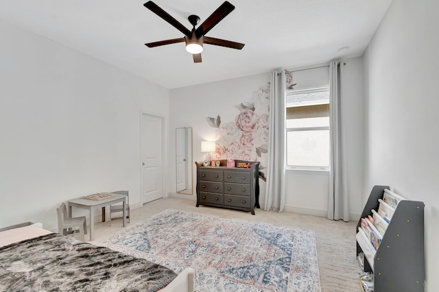bedroom featuring carpet and a ceiling fan