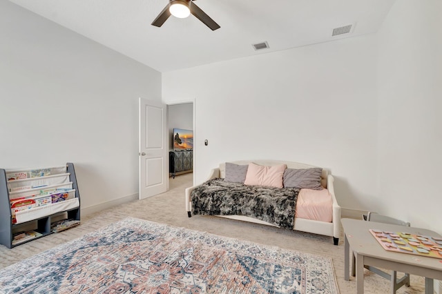 living area with baseboards, a ceiling fan, carpet flooring, and visible vents