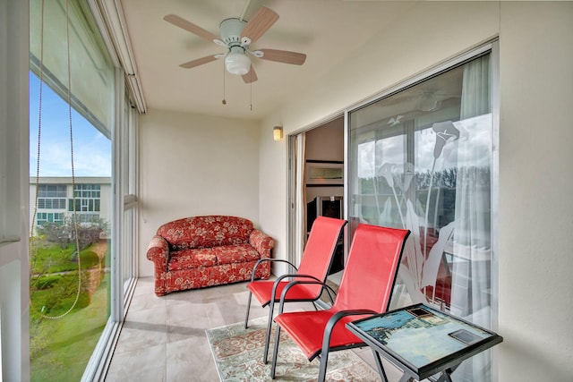 interior space featuring ceiling fan