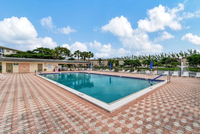 view of pool featuring a patio