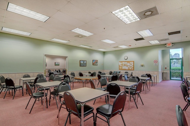 dining room with light colored carpet