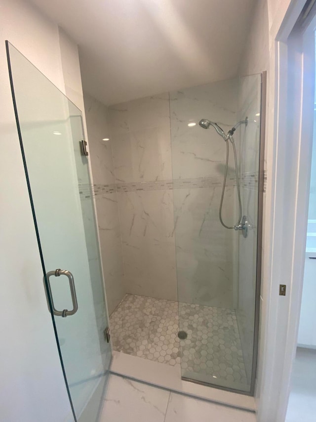 bathroom featuring walk in shower