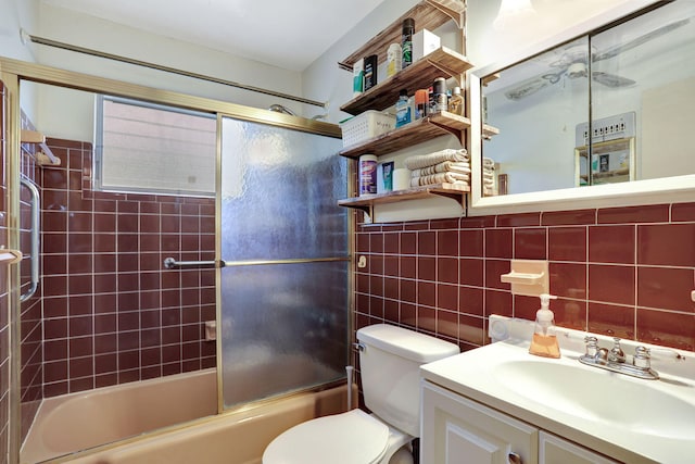 full bathroom with vanity, tasteful backsplash, enclosed tub / shower combo, tile walls, and toilet