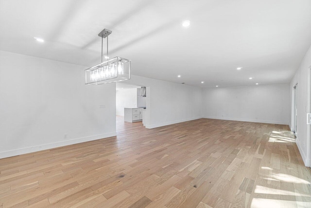 unfurnished living room with light hardwood / wood-style floors