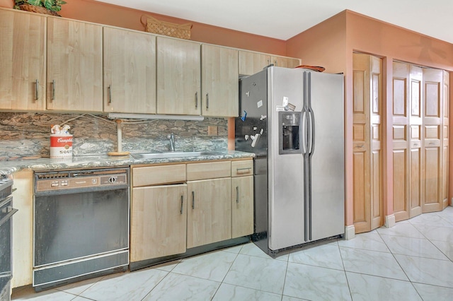 kitchen featuring dishwasher, decorative backsplash, light brown cabinets, stainless steel refrigerator with ice dispenser, and sink