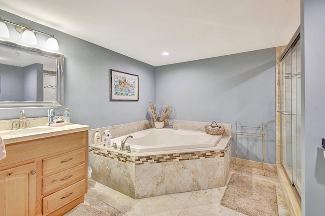 bathroom with vanity, independent shower and bath, and tile patterned floors