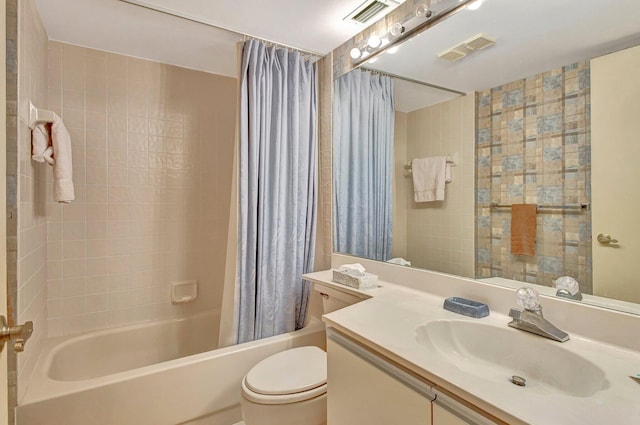 full bathroom featuring vanity, toilet, and shower / bathtub combination with curtain