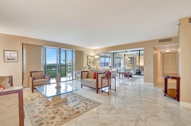 living room featuring ceiling fan