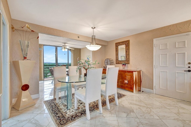 dining room featuring ceiling fan